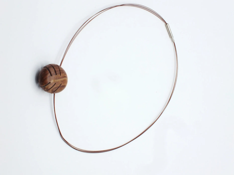 Steinfisch am Kupfer-Collier – Ostsee-Kiesel minimalistisch geschliffen
