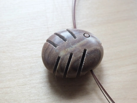 Steinfisch am Kupfer-Collier – Ostsee-Kiesel minimalistisch geschliffen