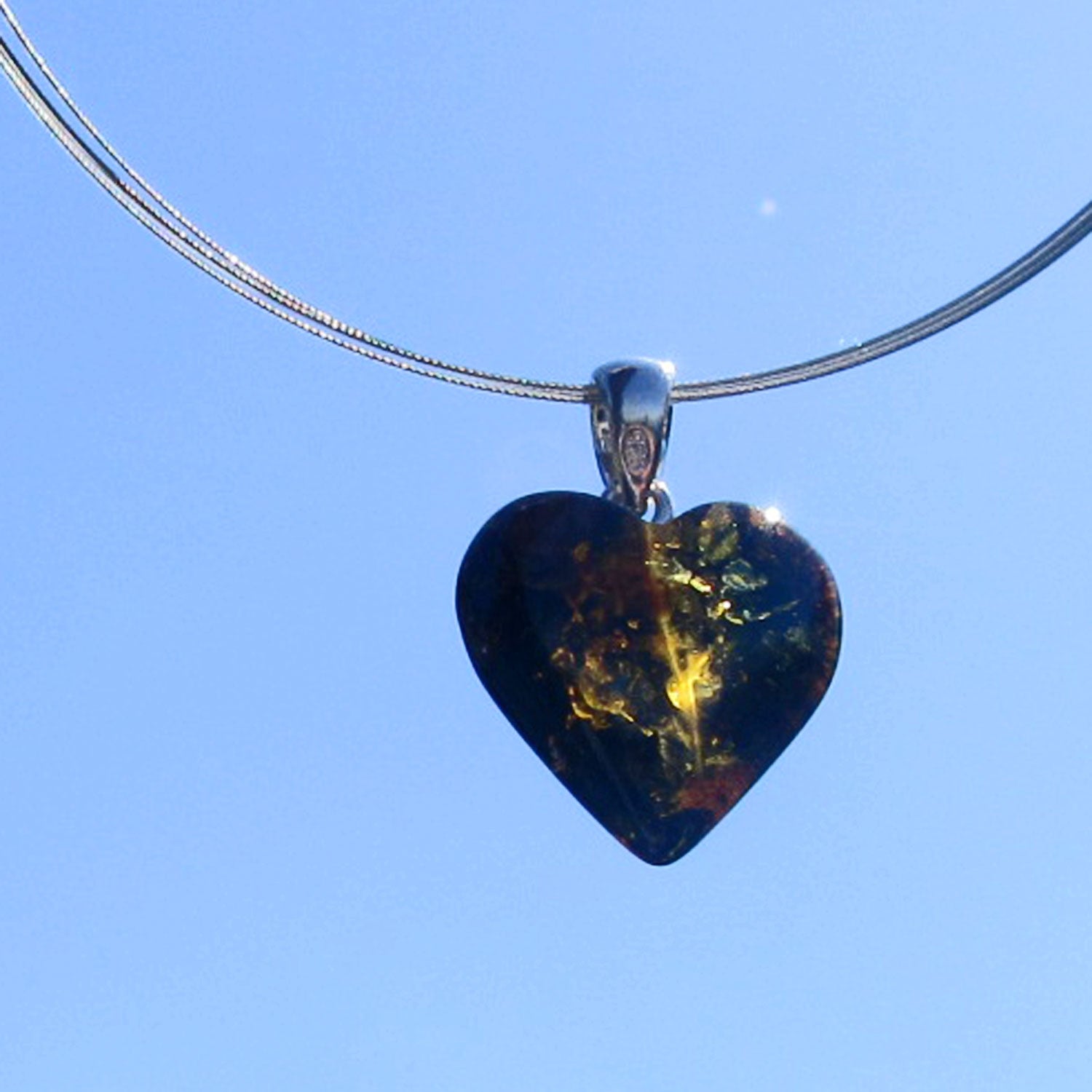 Dunkles Bernsteinherz aus 925 Silber, handgefertigt