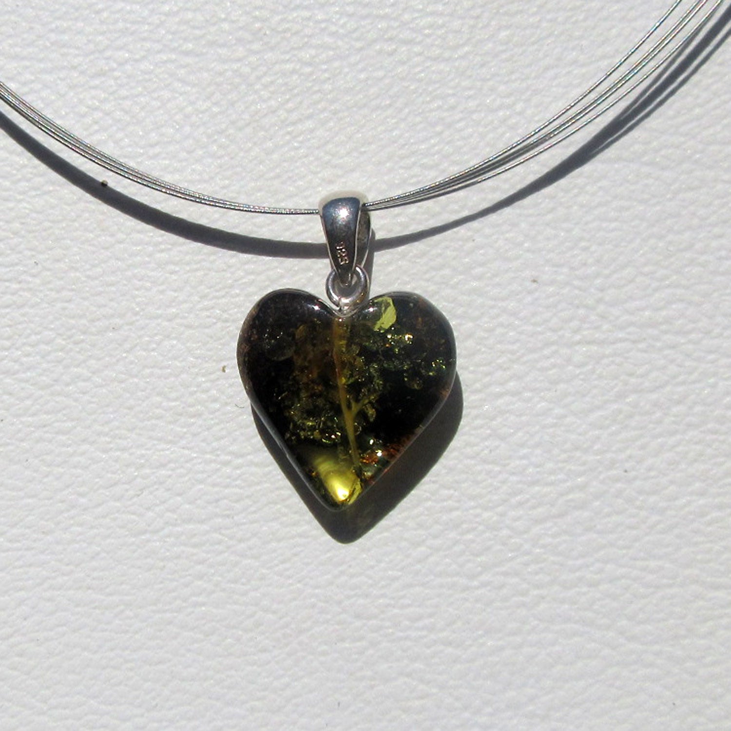 Dunkles Bernsteinherz aus 925 Silber, handgefertigt
