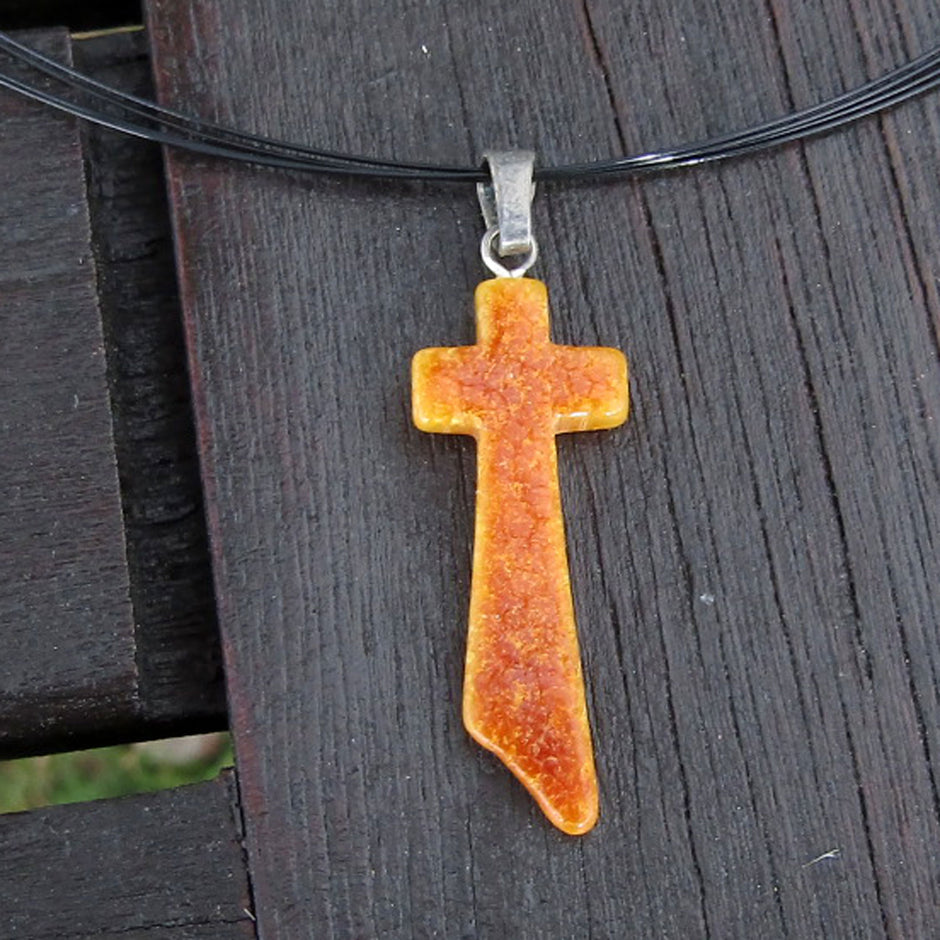 Schlankes Kreuz aus butterscotch Bernstein, Unikat