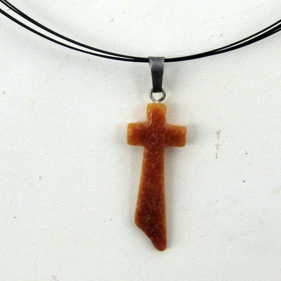Schlankes Kreuz aus butterscotch Bernstein, Unikat