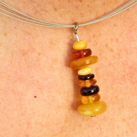 Einzelstück: Bernsteinleuchtturm am Baumwollband