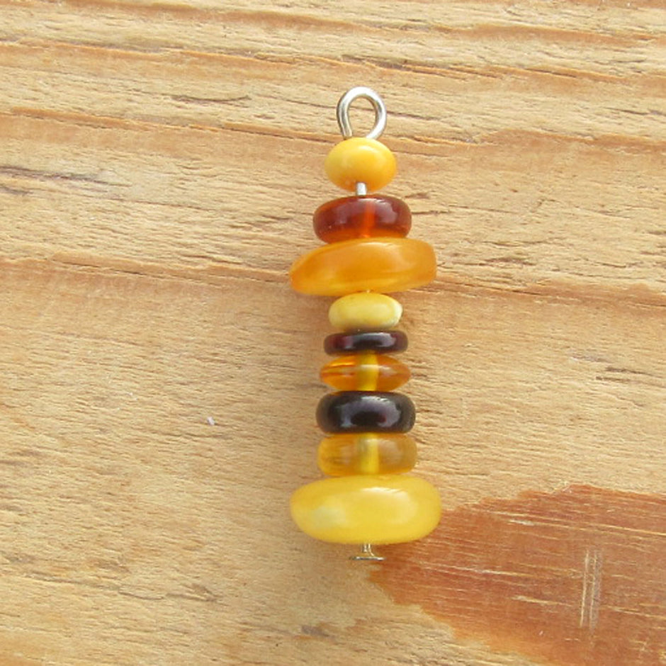 Einzelstück: Bernsteinleuchtturm am Baumwollband