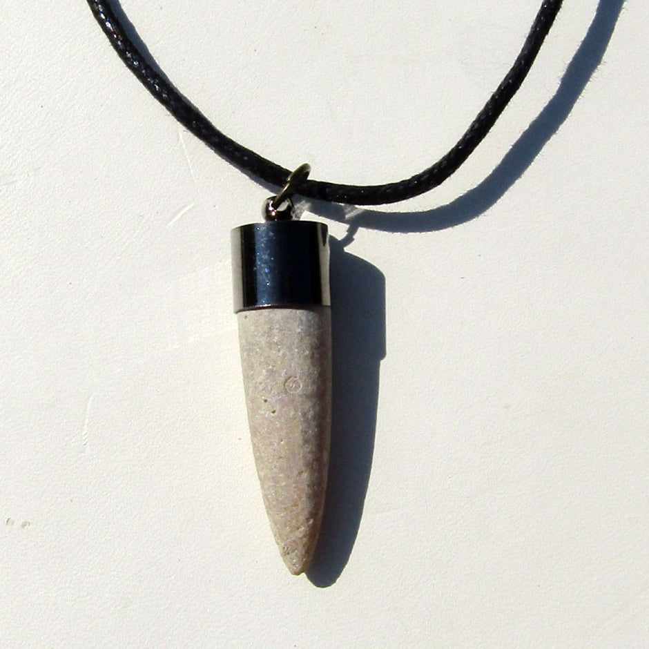 Belemnit mit geschwärzter Metallkappe, Einzelstück