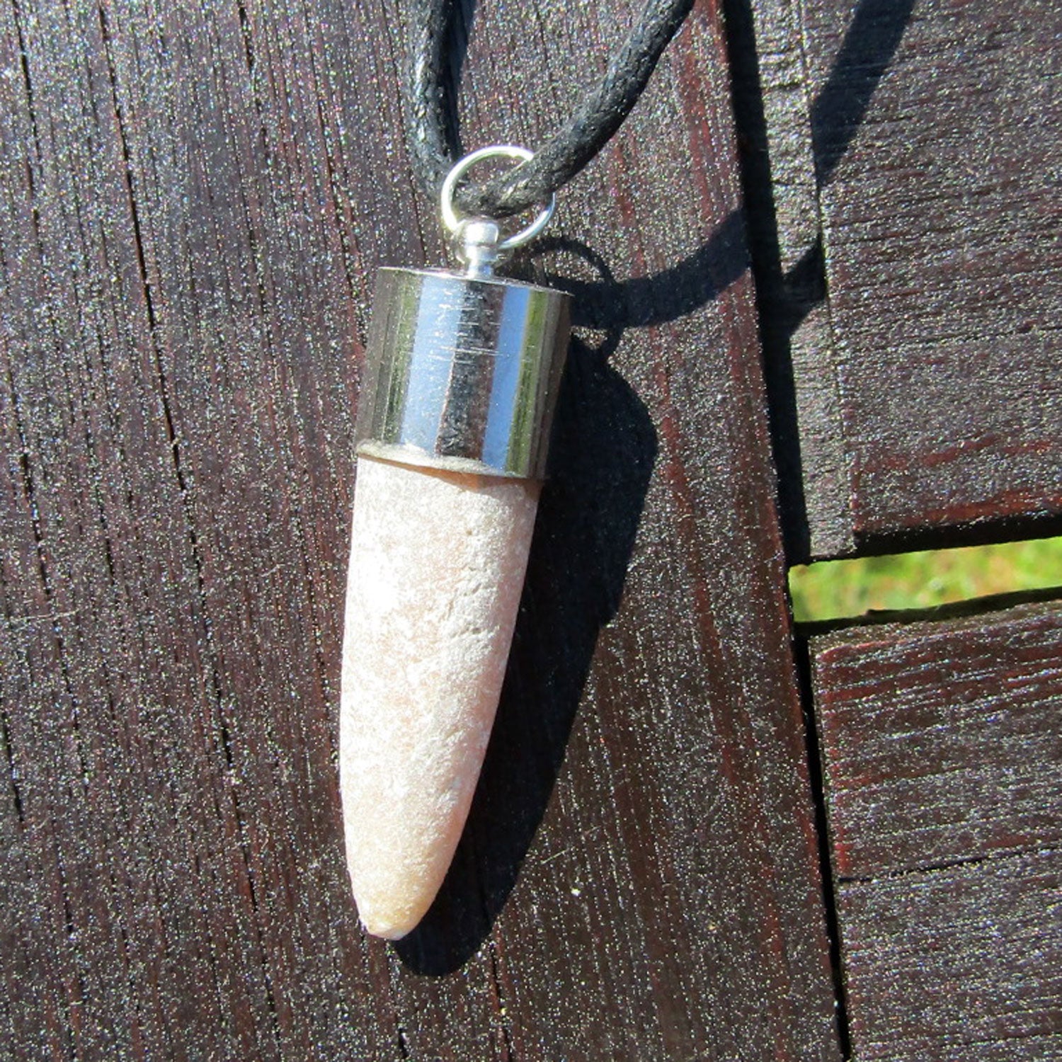 Donnerkeil (Belemnit) mit Metallkappe – Einzelstück