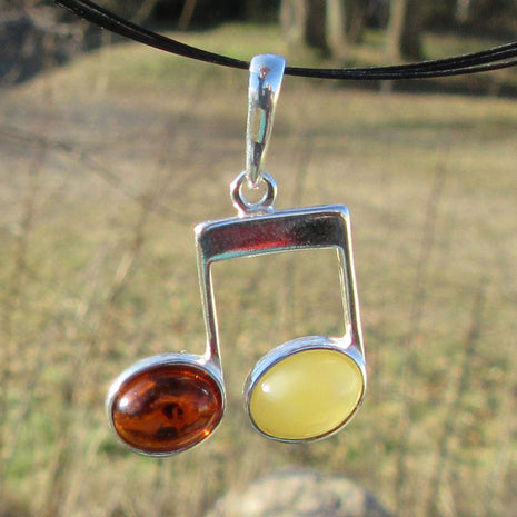 Silberanhänger Doppelnote mit Bernstein, Einzelstück