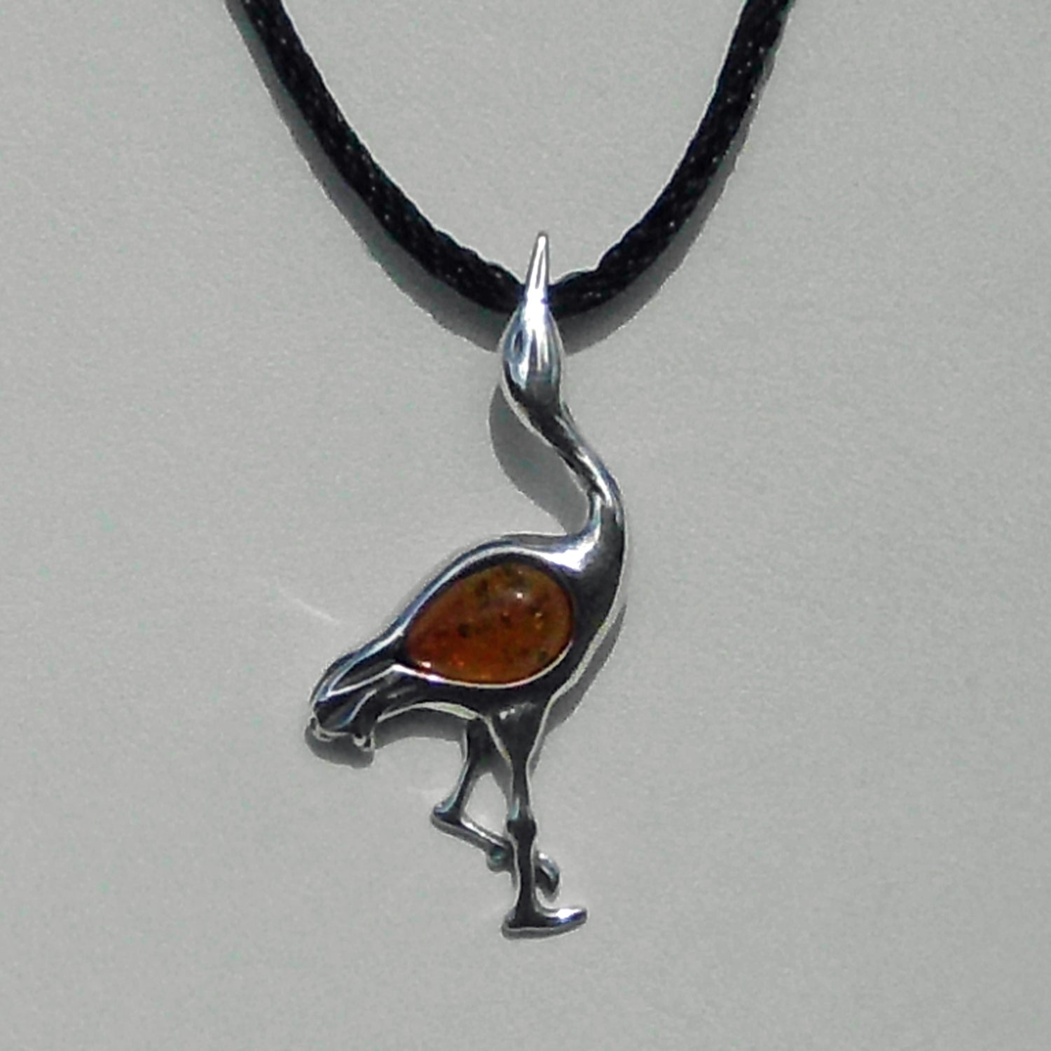 Kranich-Anhänger aus 925 Silber mit Bernstein, Unikat