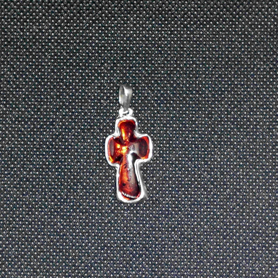 Einzelstück: Kreuz aus transparentem Bernstein in Silber