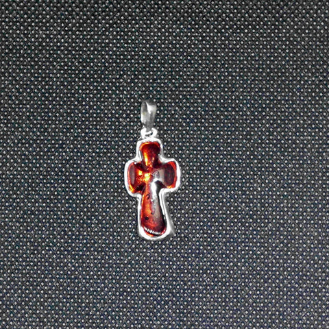 Einzelstück: Kreuz aus transparentem Bernstein in Silber