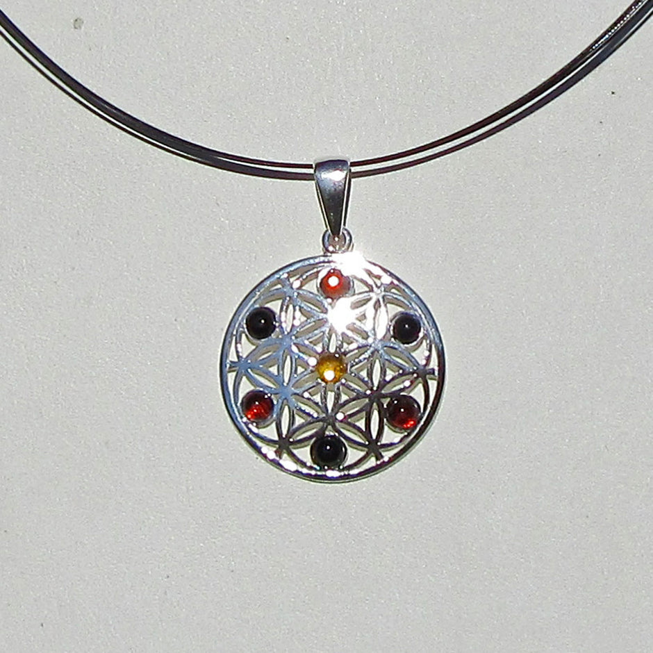 Filigraner Silberanhänger mit kognacfarbenem Bernstein