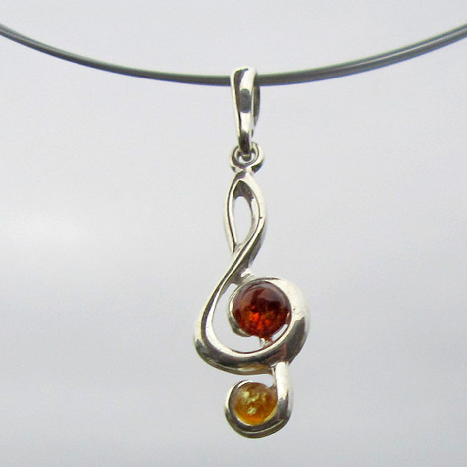 Feiner Silberanhänger mit Bernstein-Notenschlüssel