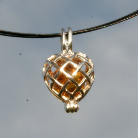 Aufklappbarer Herzanhänger mit Bernstein und Silber