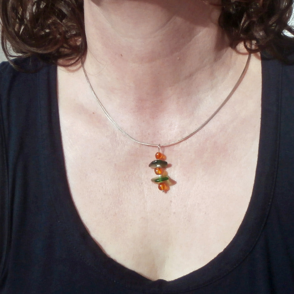 Unikat Anhänger aus Seeglas und Bernstein mit Silberperlen