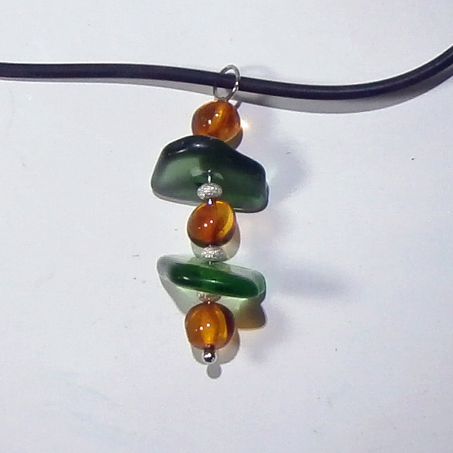 Unikat Anhänger aus Seeglas und Bernstein mit Silberperlen