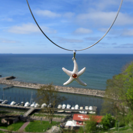 Seestern aus Silber mit Bernsteinperle, Unikat