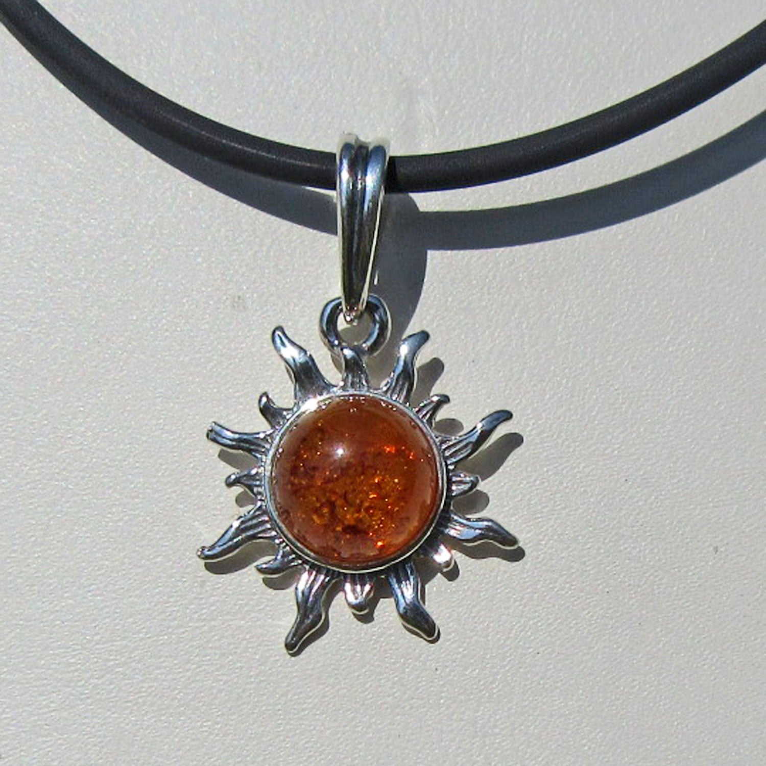 Kleine Sonne aus Silber( 925 )mit verschiedenen Bernstein