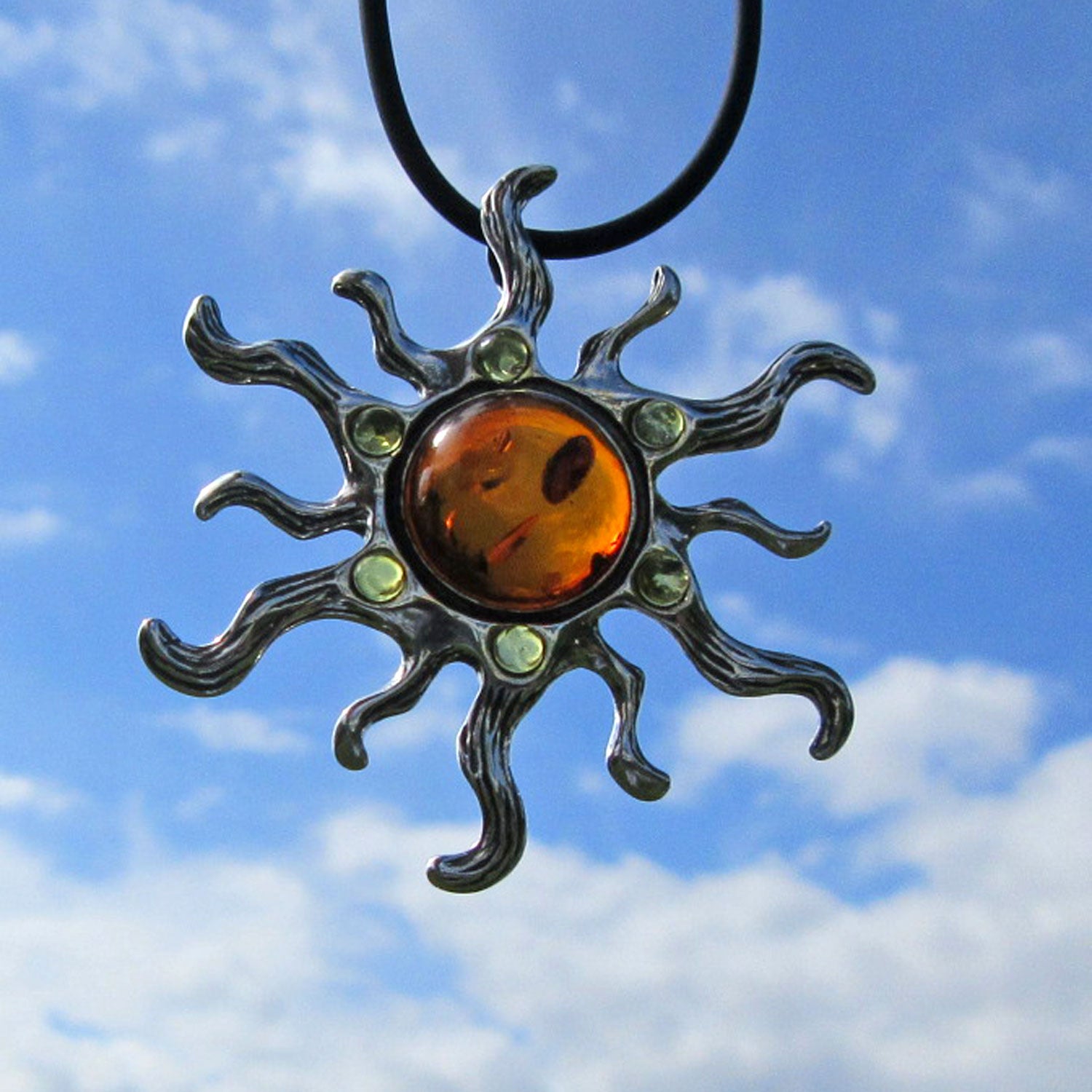 Silberne Sonne mit kognacfarbenem Bernstein, Unikat