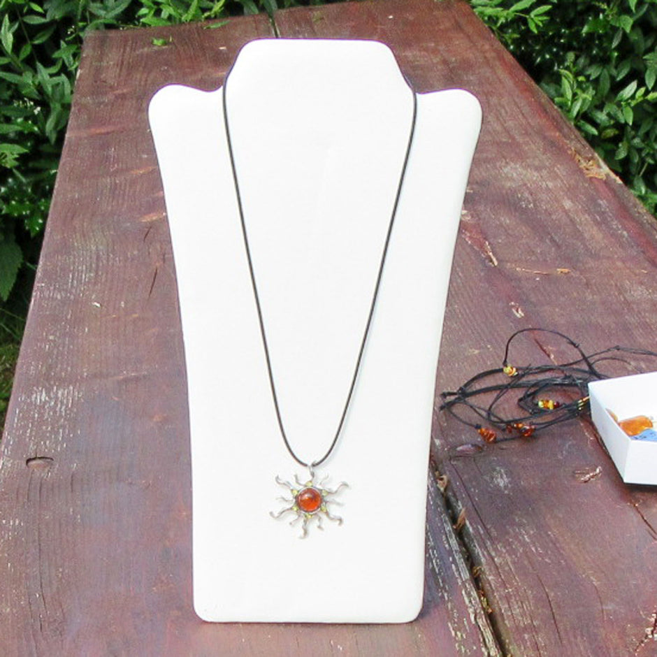 Silberne Sonne mit kognacfarbenem Bernstein, Unikat