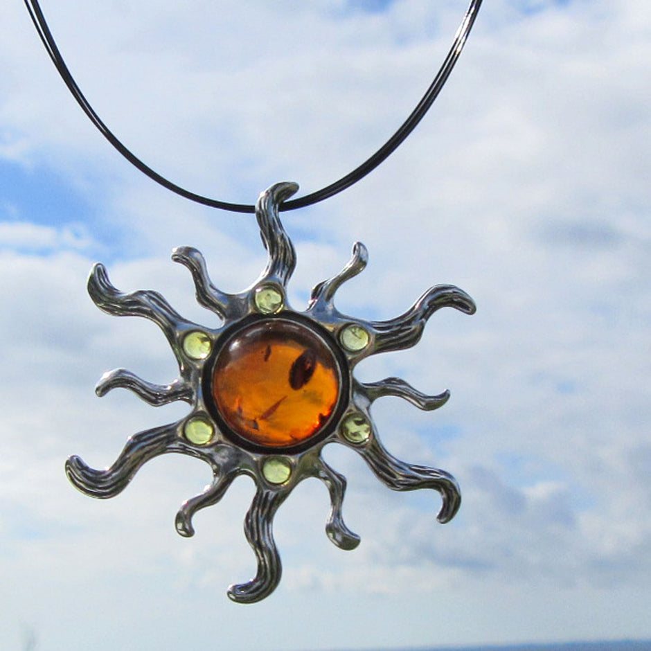 Silberne Sonne mit kognacfarbenem Bernstein, Unikat