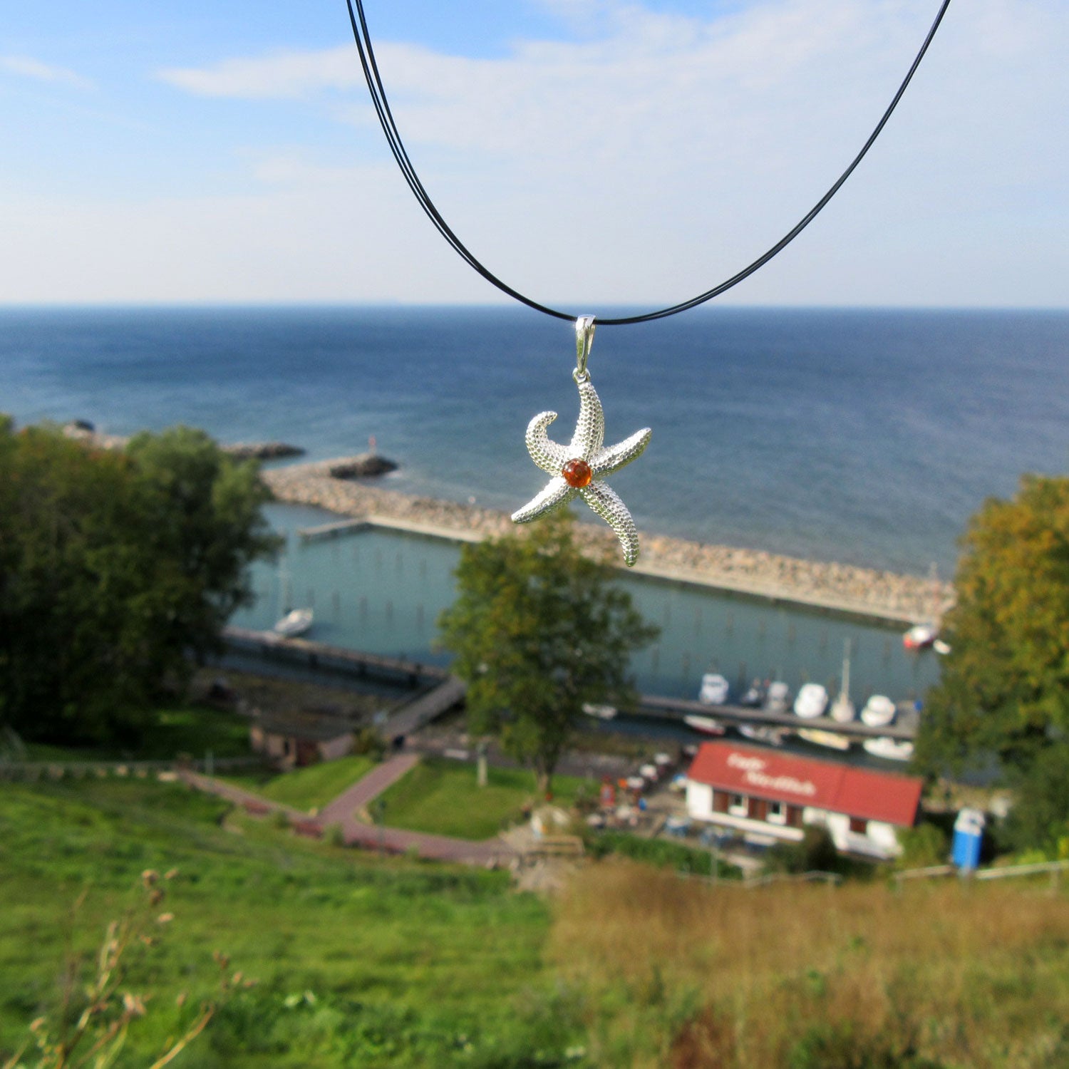 Silberanhänger Seestern mit Bernsteinperle, Unikat