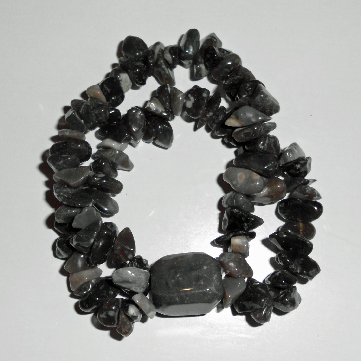 Splitterarmband aus Feuerstein mit Barockstein