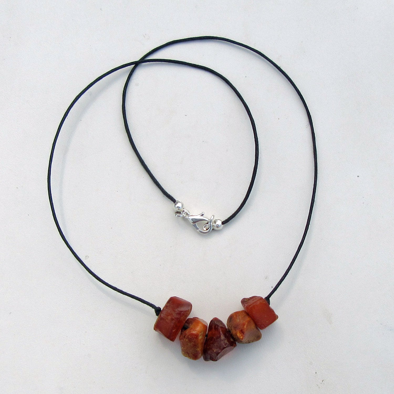 Collier aus 5 unpolierten Bernsteinen in Silber