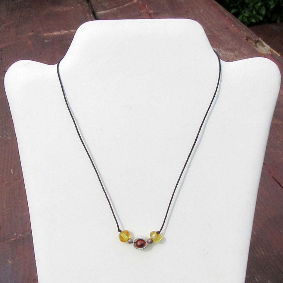 Collier aus Bernstein und Silberring, oval, Unikat