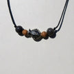 Collier mit Feuersteinkugeln und Fisch aus Silber