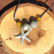 Collier aus Feuerstein und Bernstein mit silbernem Seestern