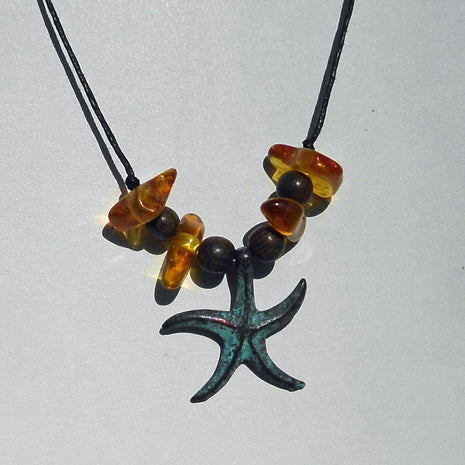 Grüner Patinaschmuck Seestern aus Kupfer mit Bernstein