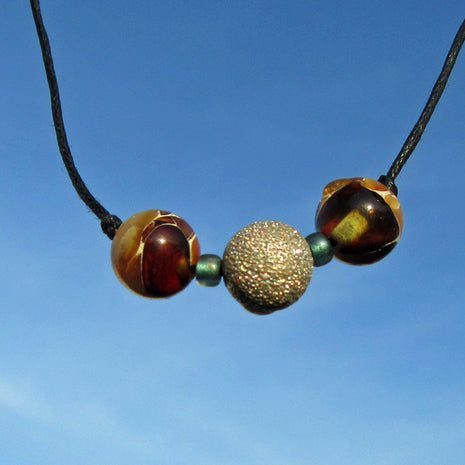 Collier aus Mosaikbernstein und diamantierter Silberperle