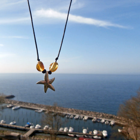 Collier aus Bernsteinperlen mit silbernem Seestern