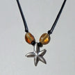 Collier aus Bernsteinperlen mit silbernem Seestern