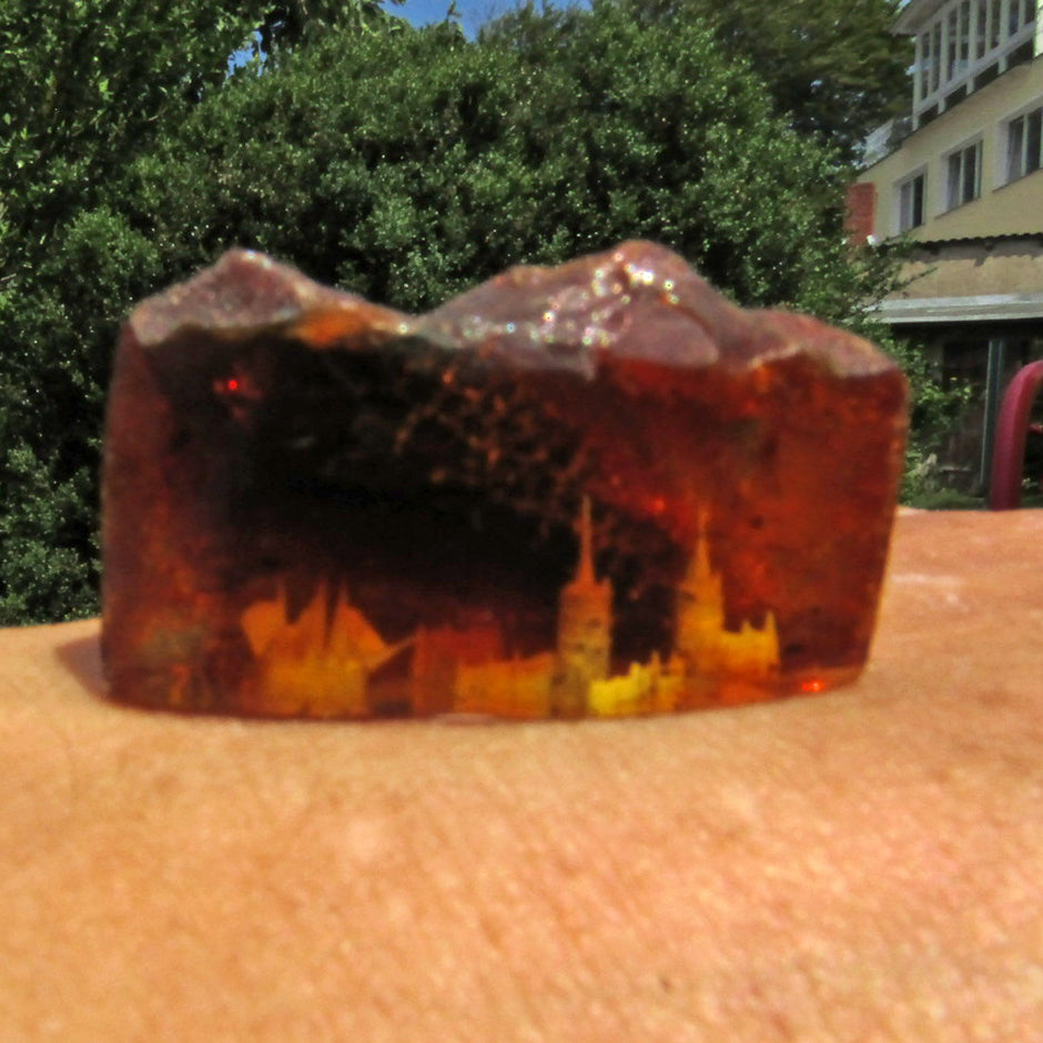 Bernstein Unikat mit Segelschiff und Stadtmotiv