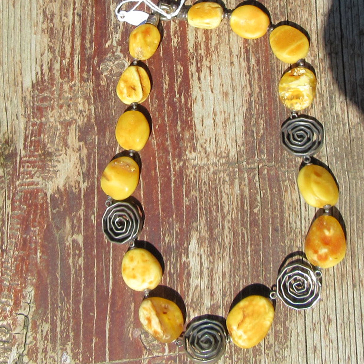 Designerstück - Bernsteinkette mit Silberspiralen