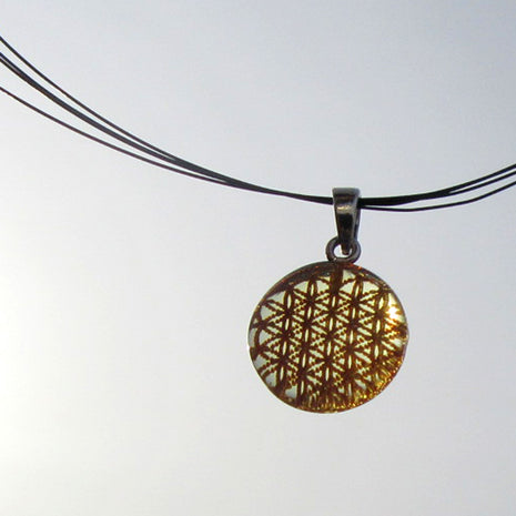 Filigraner Anhänger aus Bernstein mit Blume des Lebens