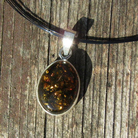 Silberanhänger mit grünlichem Bernstein, Unikat