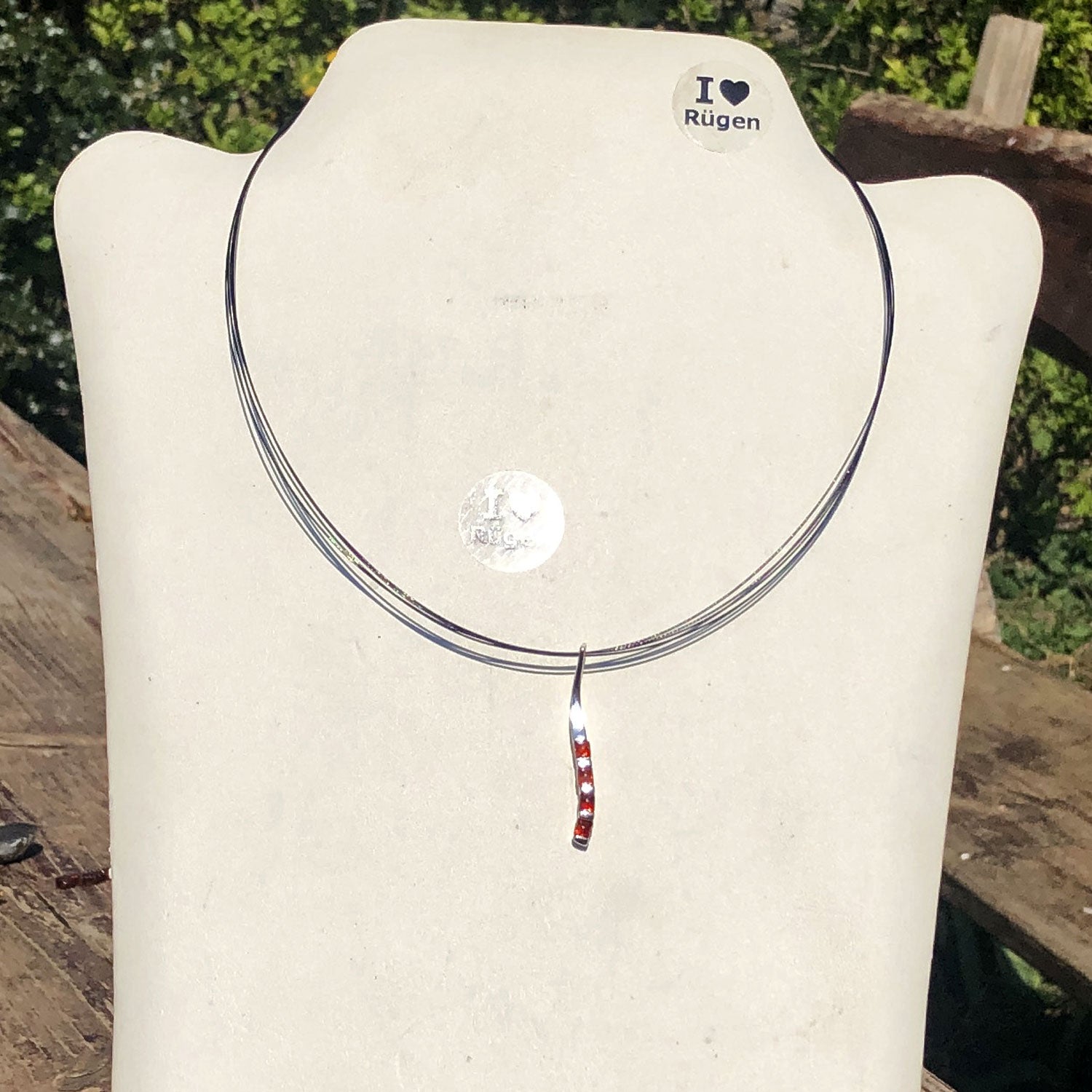 Eleganter Anhänger mit 4 kleinen Bernsteinen in Silber