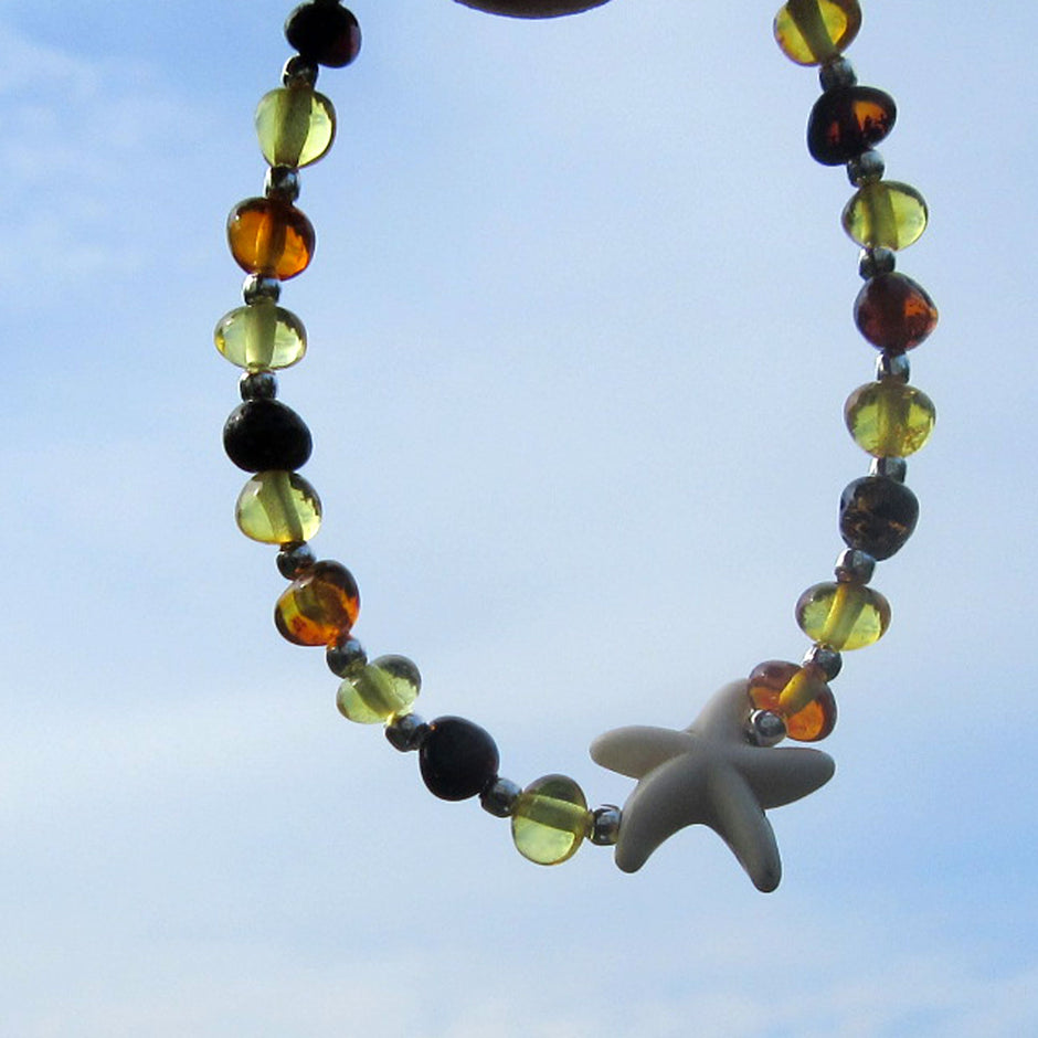 Einzigartiges Kinderarmband aus Bernstein und Seestern