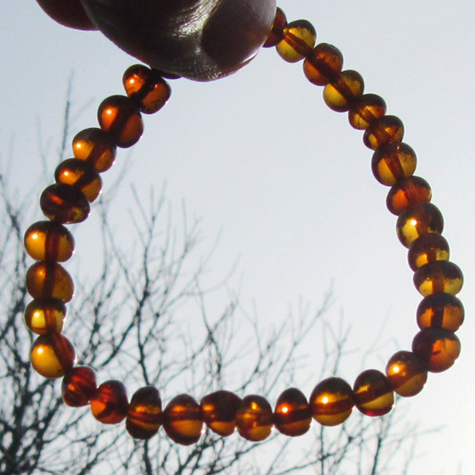 Elegantes Armband aus kognacfarbenem Bernstein, Unikat