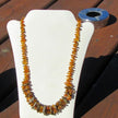 Zweireihiges Bernsteincollier aus dunklem und kognacfarbenem Bernstein