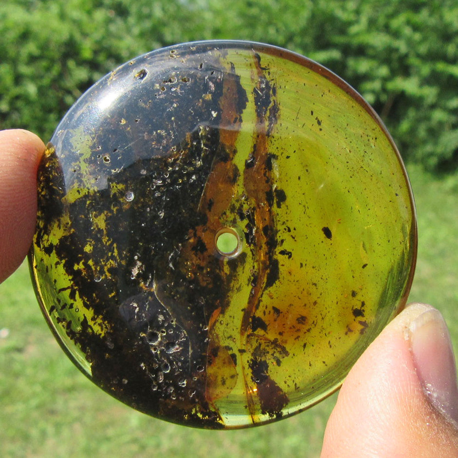 Wunderschöner, riesiger Bernsteindonut mit vielen Einschlüssen