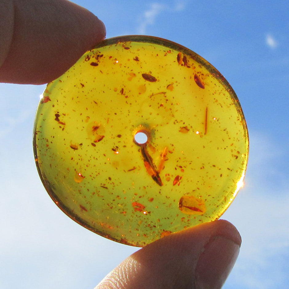 Kognacfarbener Bernsteindonut, handgeschliffen und einzigartig