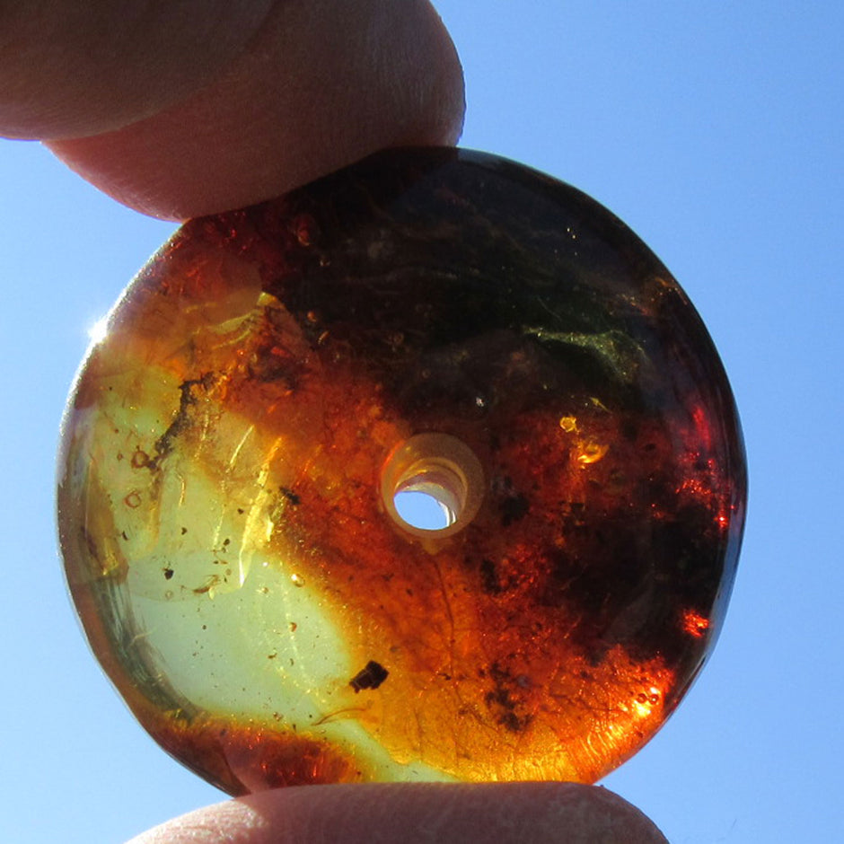 Bernsteindonut, poliert, mit Einschlüssen, Unikat