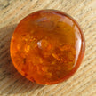 Polierter Bernsteindonut mit Einschlüssen, Einzelstück
