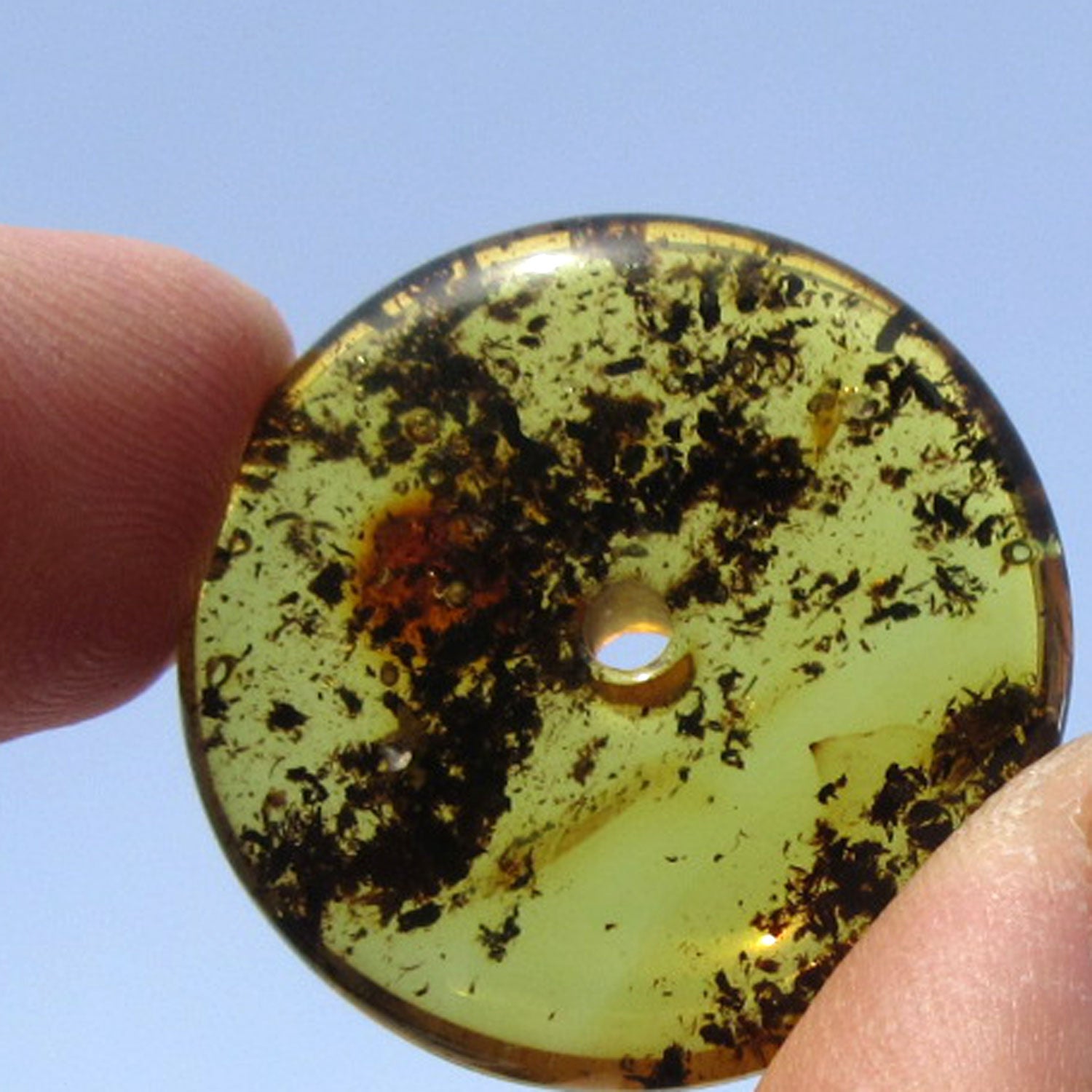 Transparenter Bernsteindonut – Natürliches Unikat von Rügen