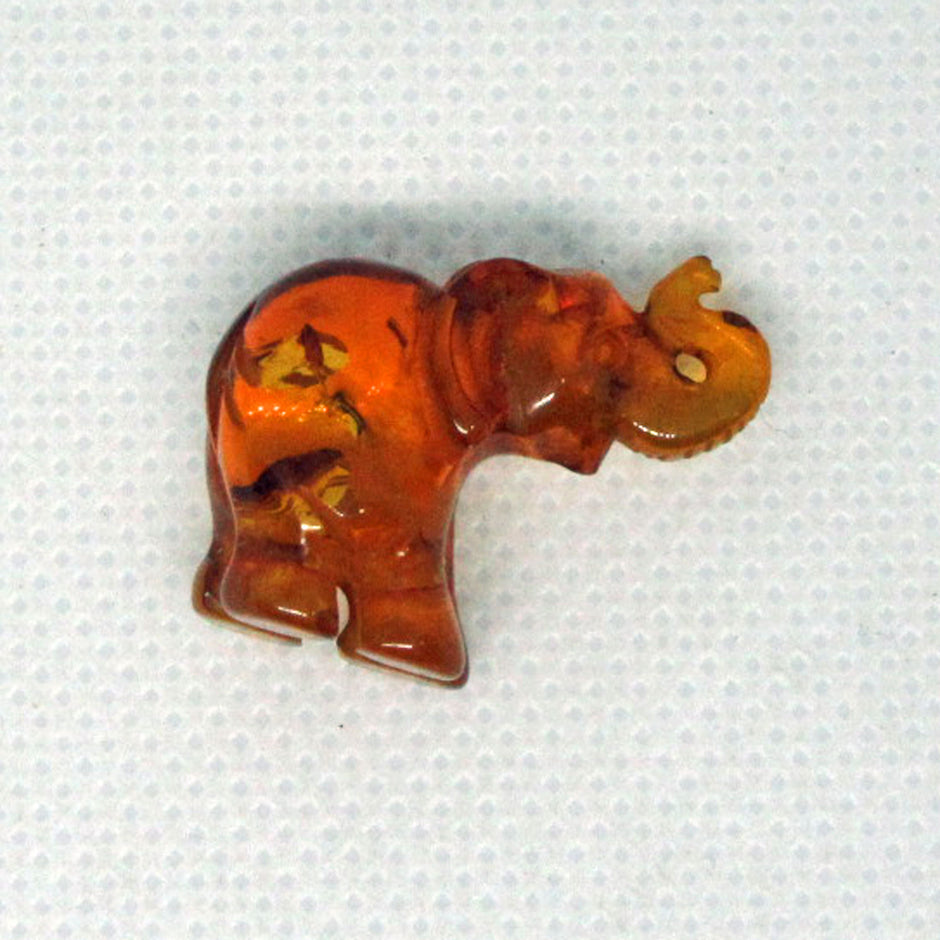 Kleiner Elefant aus edlem Bernstein, kognacfarben