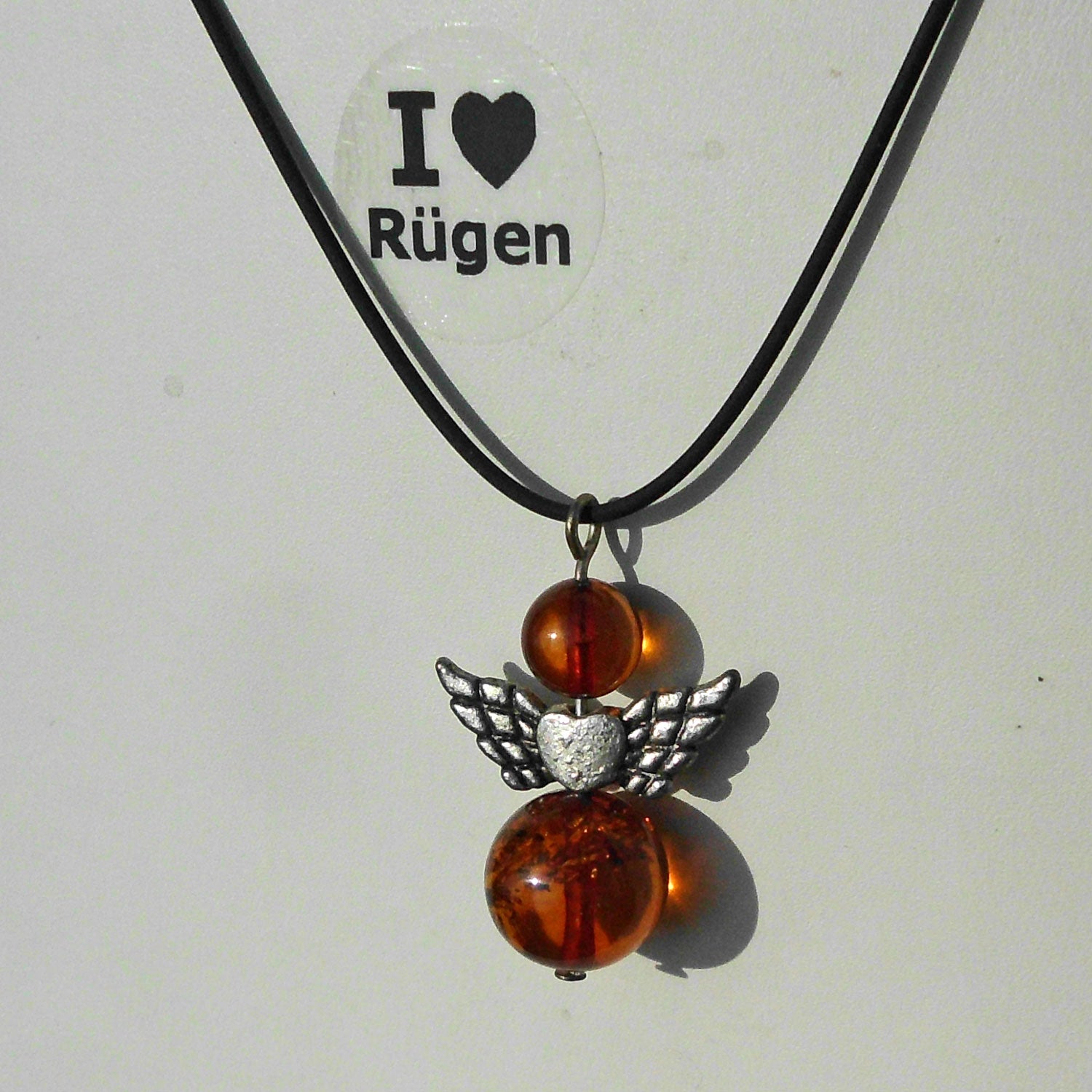 Bernsteinengel mit Silberflügeln, einzigartig und schützend