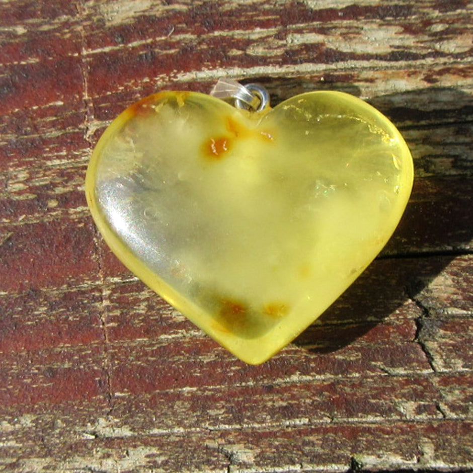 Sonnengelbes Bernsteinherz mit Wolke aus Silber